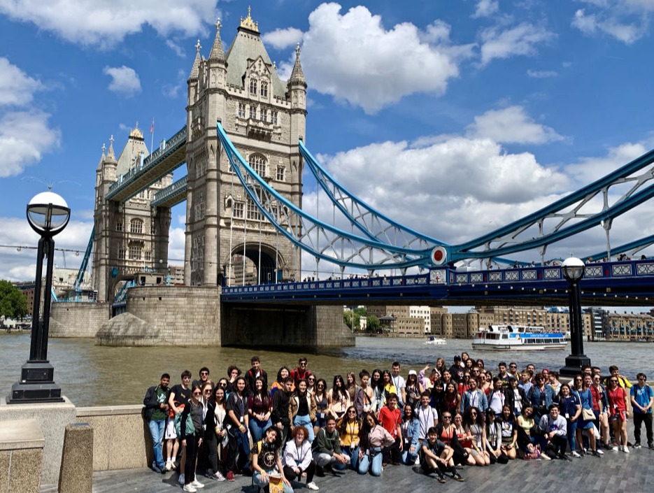group of international students in front of Tower Bridge in London