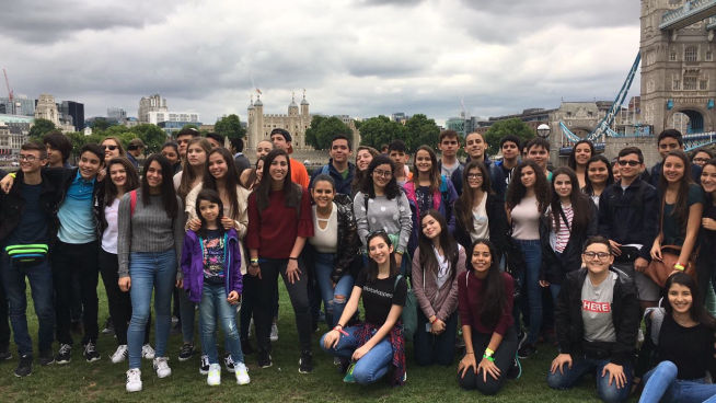 group of international students in London with the Tower of London in background